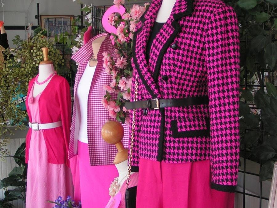 Three Mahicans with women's close on them 